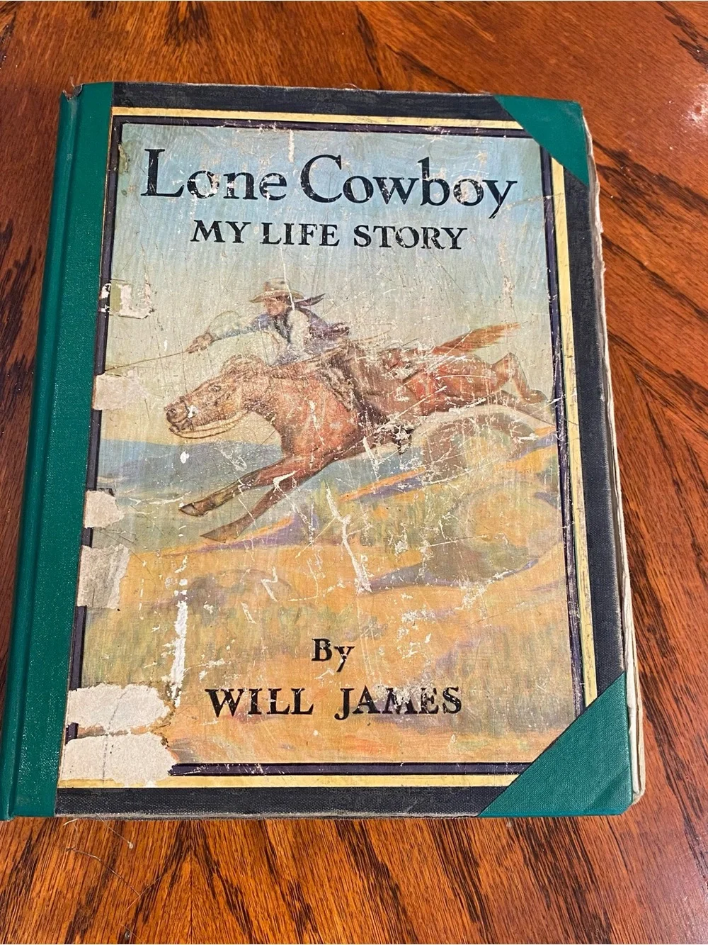 Old Book- Lone Cowboy by Will James also includes a lithograph by CW Anderson